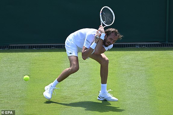 epa12206065 Daniil Medvedev of Russia in action during the Men's 1st round match against Benjamin Bonzi of France at the Wimbledon Championships, Wimbledon, Britain, 30 June 2025.  EPA/DANIEL HAMBURY  EDITORIAL USE ONLY EDITORIAL USE ONLY