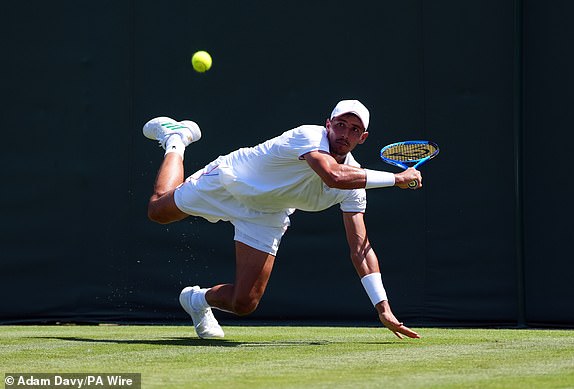 Alexei Popyrin during his match against Arthur Fery on day one of the 2025 Wimbledon Championships at the All England Lawn Tennis and Croquet Club, London. Picture date: Monday June 30, 2025. PA Photo. Photo credit should read: Adam Davy/PA Wire.RESTRICTIONS: Editorial use only. No commercial use without prior written consent of the AELTC. Still image use only - no moving images to emulate broadcast. No superimposing or removal of sponsor/ad logos.
