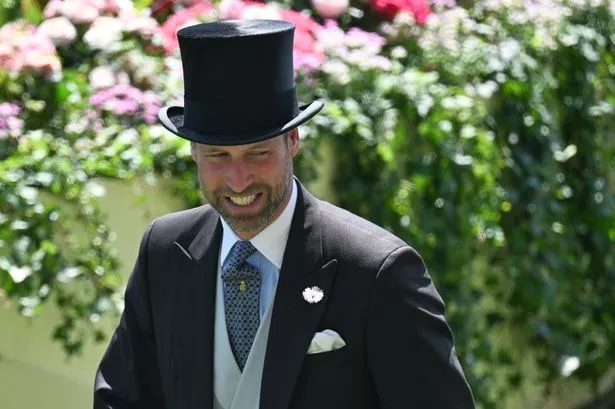 Carole Middleton 'mothers' Prince William in 'maternal hug' as Princess Kate absent from Royal Ascot