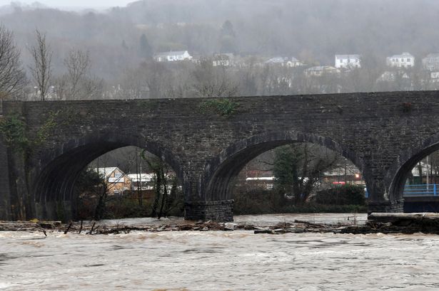 High river level  under a bridge 