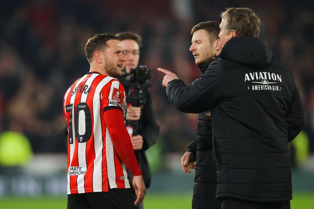 Phil Parkinson and Billy Sharp clashed after the FA Cup tie