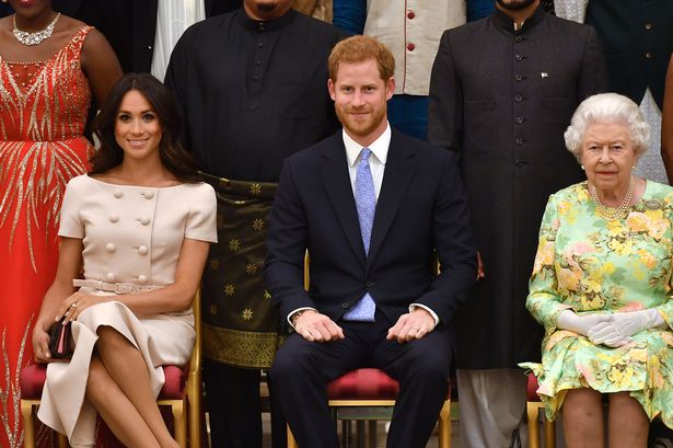 Harry and Meghan with the late Queen in 2018