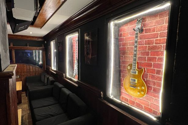 Guitars on the wall in Scruffy's