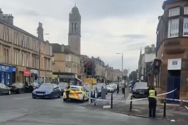 Police pictured at the scene on Saturday evening