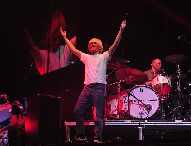 Tim Burgess of The Charlatans performing at the Manchester Arena. Manchester. James and The Charlatans concert. December 8, 2018