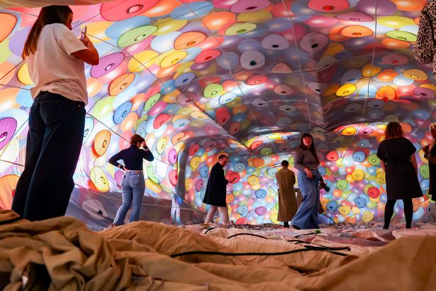 INSIDE the envelope of the UP  Hot Air Balloon at Cameron Balloons in Bristol this morning, Thursday 13 March 2025, as the fiesta announced  a brand new attraction for the 2025 Bristol International Balloon Fiesta.   'In The Clouds' offers festivalgoers to venture inside a cold inflated hot air balloon while listening to a soundscape of flight and flights of the past.   PHOTO:PAUL GILLIS / Reach Plc