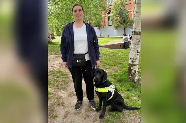 Jennie Harrison, 35, from Didsbury, with her guide dog, Brandy