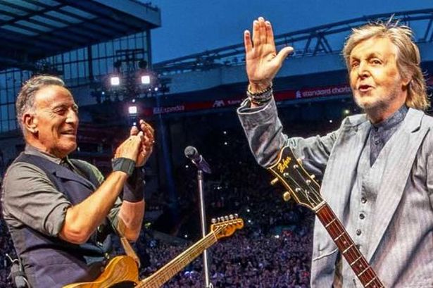 Bruce Springsteen and Sir Paul McCartney on stage at Anfield