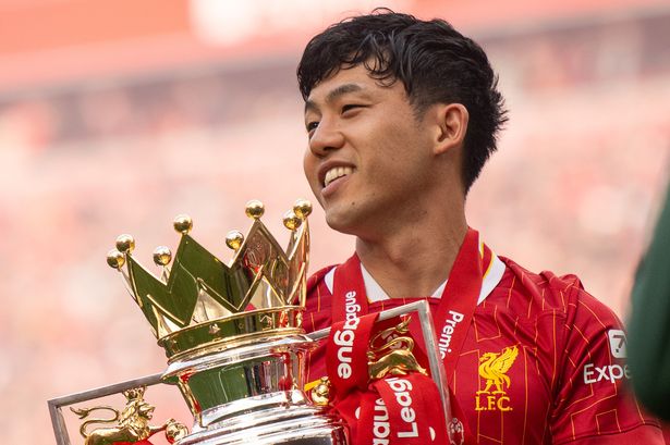 Wataru Endo celebrates as Liverpool are crowned Premier League champions