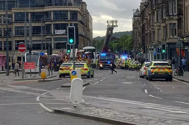 Emergency services locked down the street.

