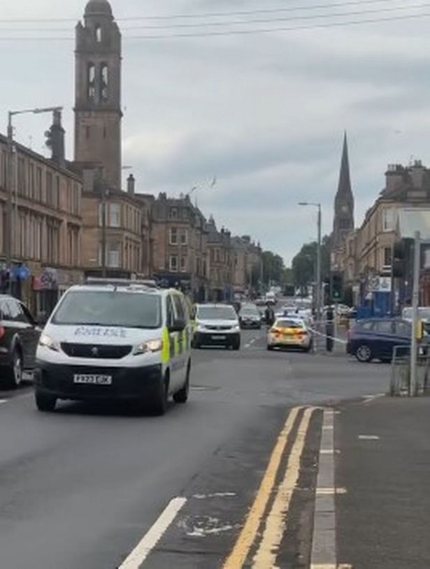 Officers pictured on Albert Drive in Pollokshields