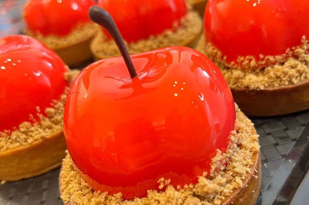 A shiny bakewell tart that is on offer at the bakery