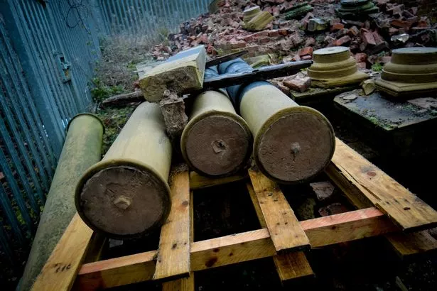 Once elegant columns and bricks - the aftermath of the surviving facade of the former Whitefield Town Hall being demolished 