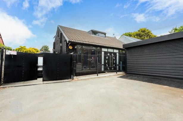 House dubbed "blackest house ever". 