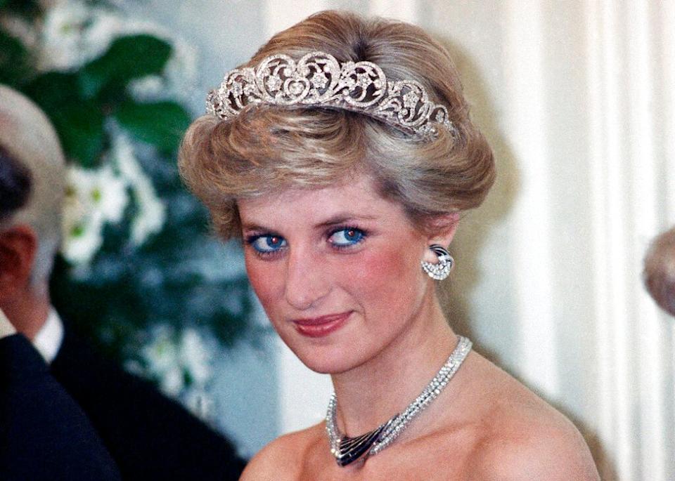 FILE – In this Monday, Nov. 2, 1987 file photo, Britain’s Diana, the Princess of Wales, is pictured during an evening reception given by the West German President Richard von Weizsacker in honour of the British Royal guests in the Godesberg Redoute in Bonn, Germany. For someone who began her life in the spotlight as “Shy Di,” Princess Diana became an unlikely, revolutionary during her years in the House of Windsor. She helped modernize the monarchy by making it more personal, changing the way the royal family related to people. By interacting more intimately with the public — kneeling to the level of children, sitting on edge of a patient’s hospital bed, writing personal notes to her fans — she set an example that has been followed by other royals as the monarchy worked to become more human and remain relevant in the 21st century. (AP Photo/Herman Knippertz, File)