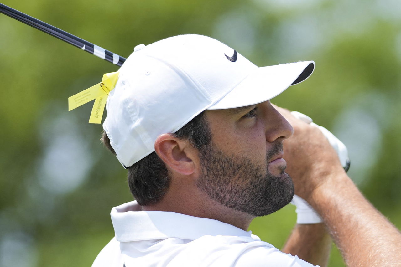 Why PGA Tour players are wearing yellow ribbons on their hats at the Memorial