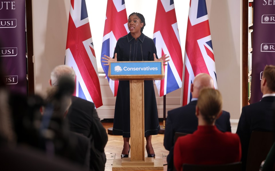 Kemi Badenoch giving a speech at a Conservative Party event.