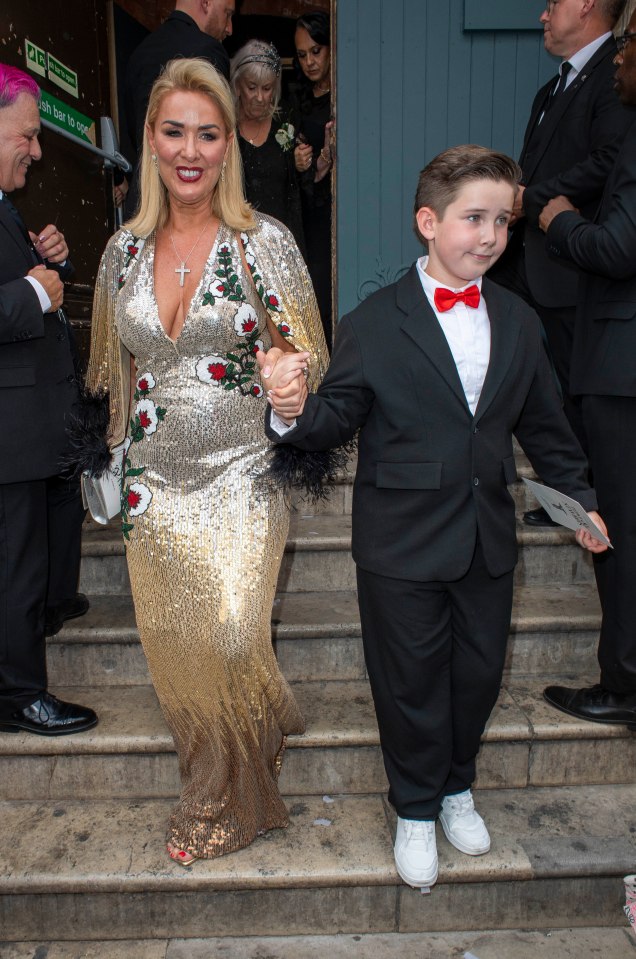 DJ Fat Tony and his partner leaving a wedding ceremony.