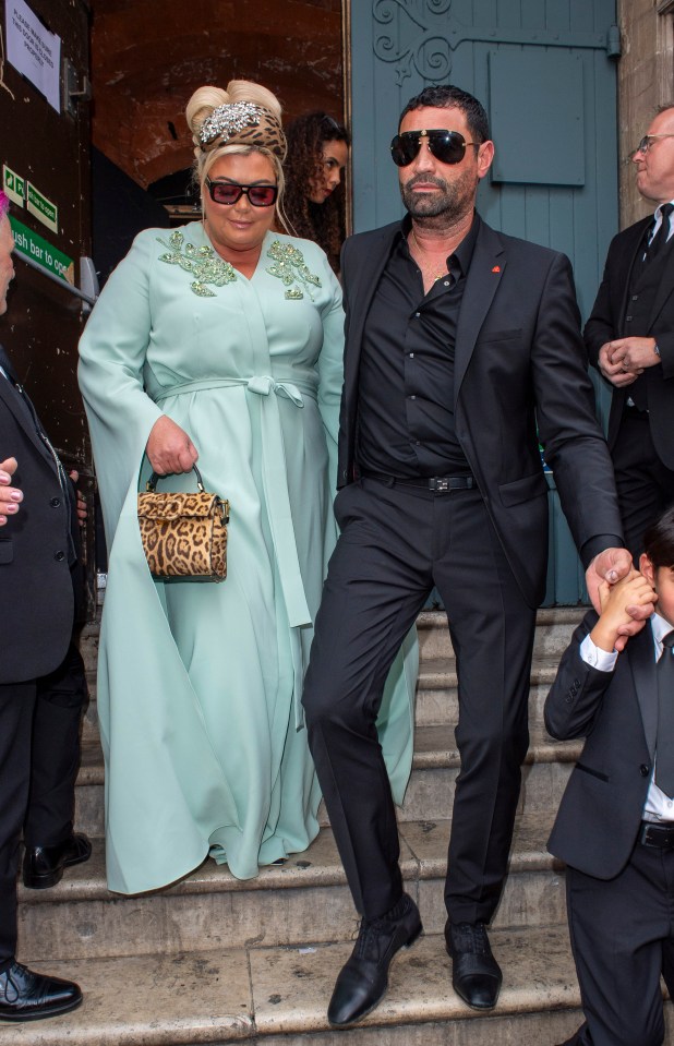 DJ Fat Tony and his partner arriving at their wedding.