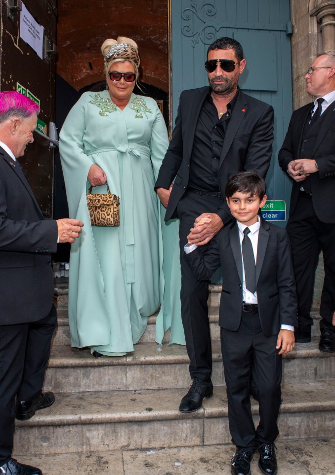 DJ Fat Tony and his partner arriving at their wedding.