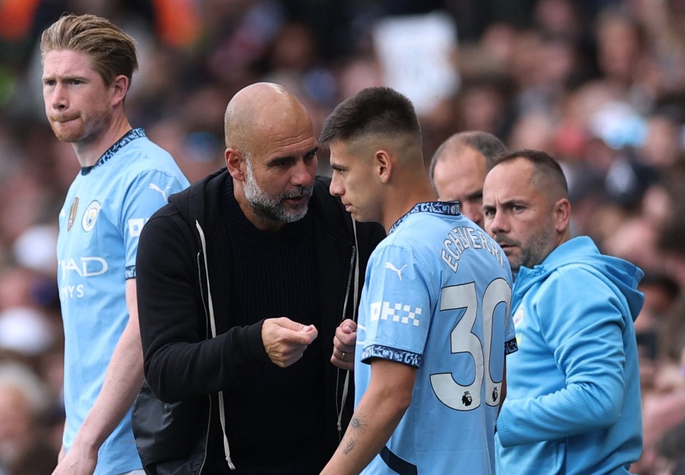 Pep Guardiola instructing Claudio Echeverri on the sidelines.
