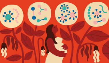 A pregnant woman standing among flowers which have microbes as petals
