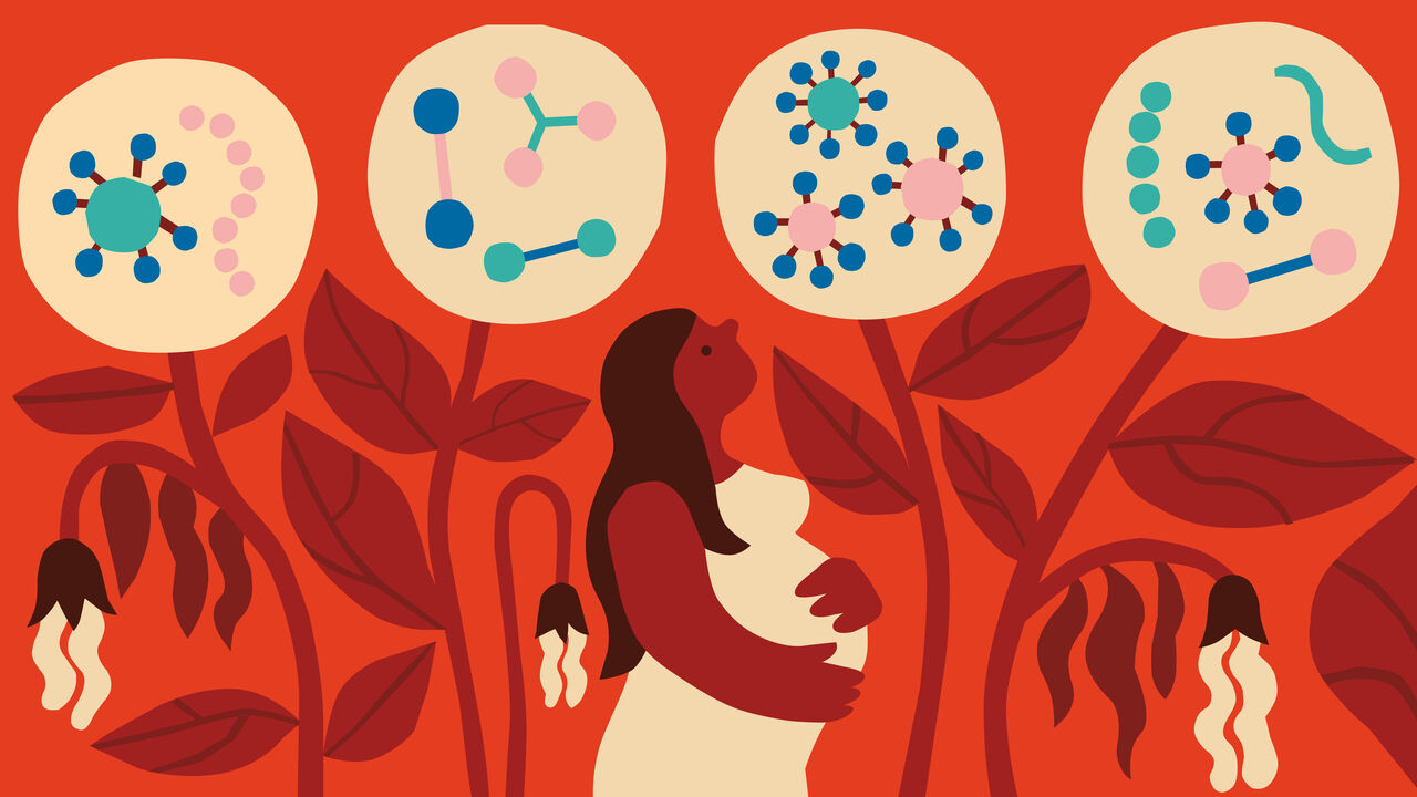 A pregnant woman standing among flowers which have microbes as petals