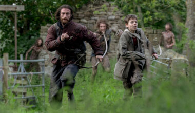 Aaron Taylor-Johnson, left, and Alfie Williams in a scene from "28 Years Later."