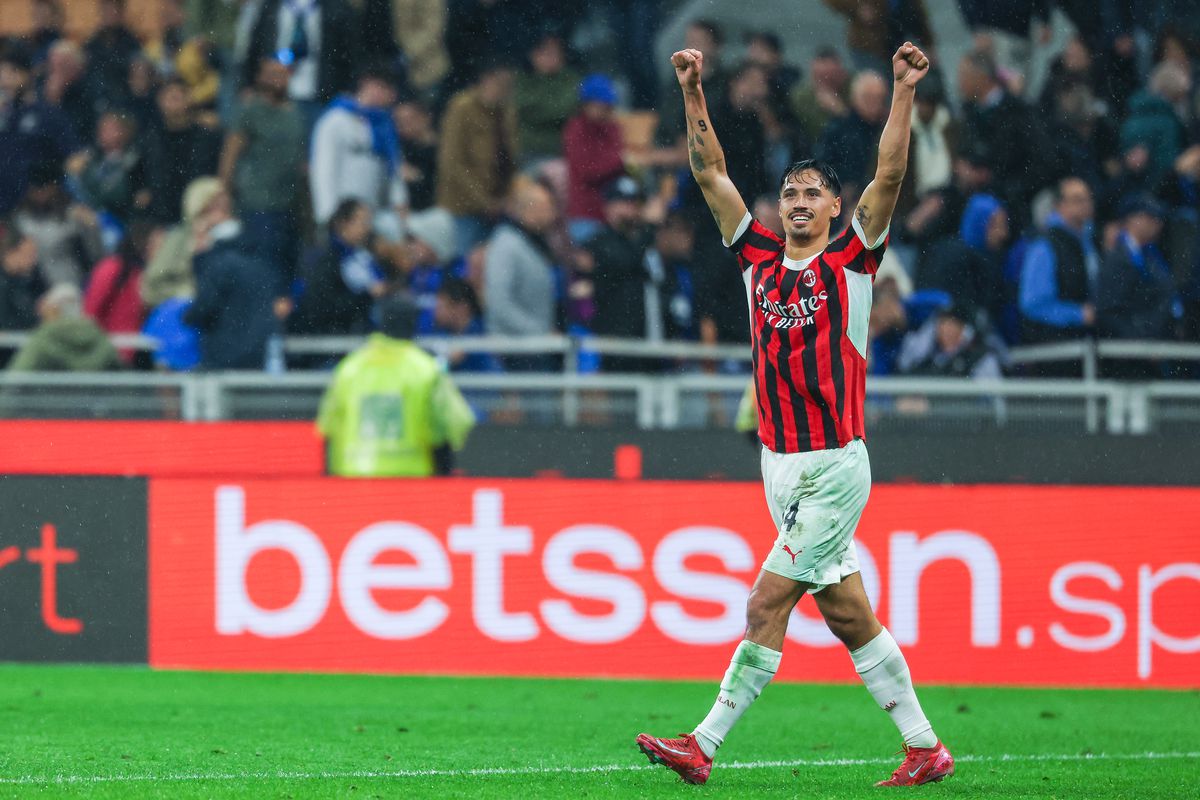 Tijjani Reijnders of AC Milan celebrates after scoring a...