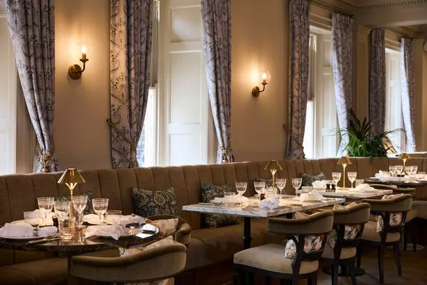The elegant dining room at Emberwood on the ground floor of the Francis Hotel