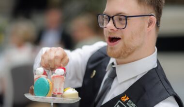 Man serves afternoon tea