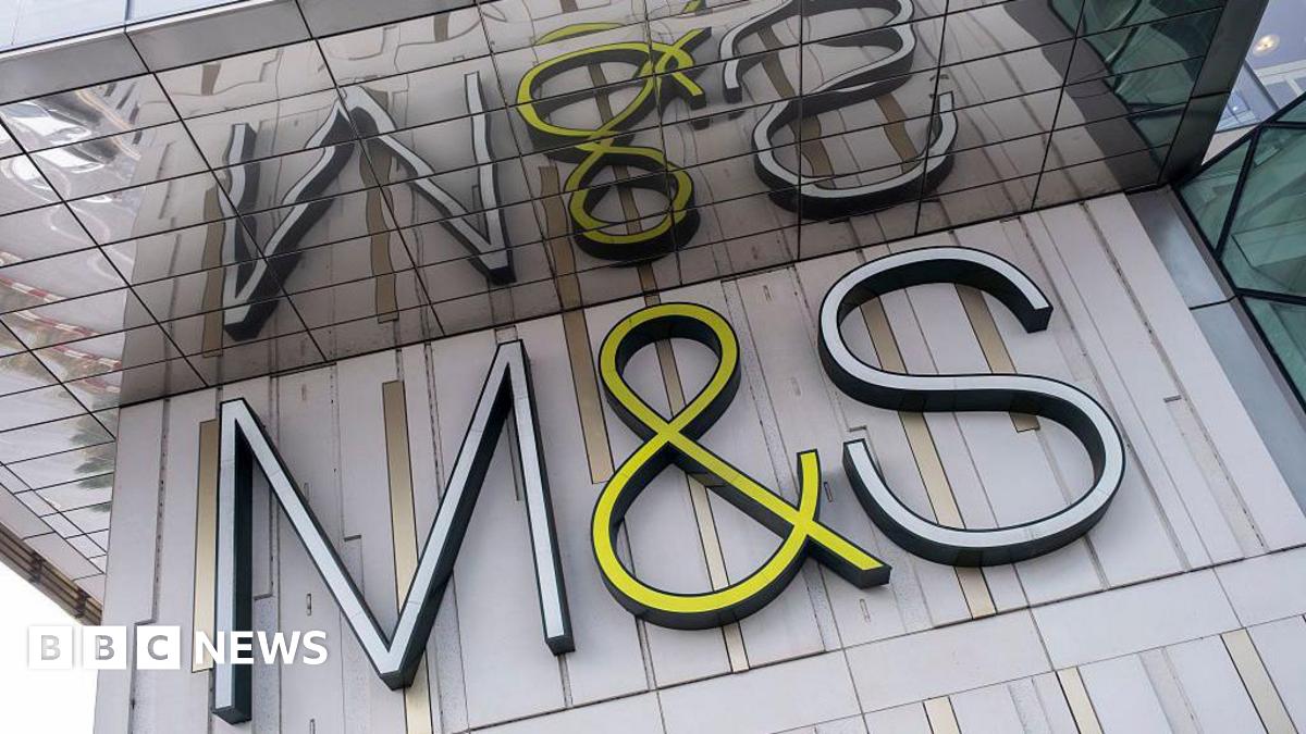 M&S sign on grey wall
