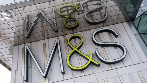 Getty Images M&S sign on grey wall