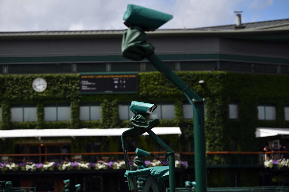Hawk-Eye cameras are pictured at the All England Lawn Tennis & Croquet Club in Wimbledon June 24, 2025. — AFP pic