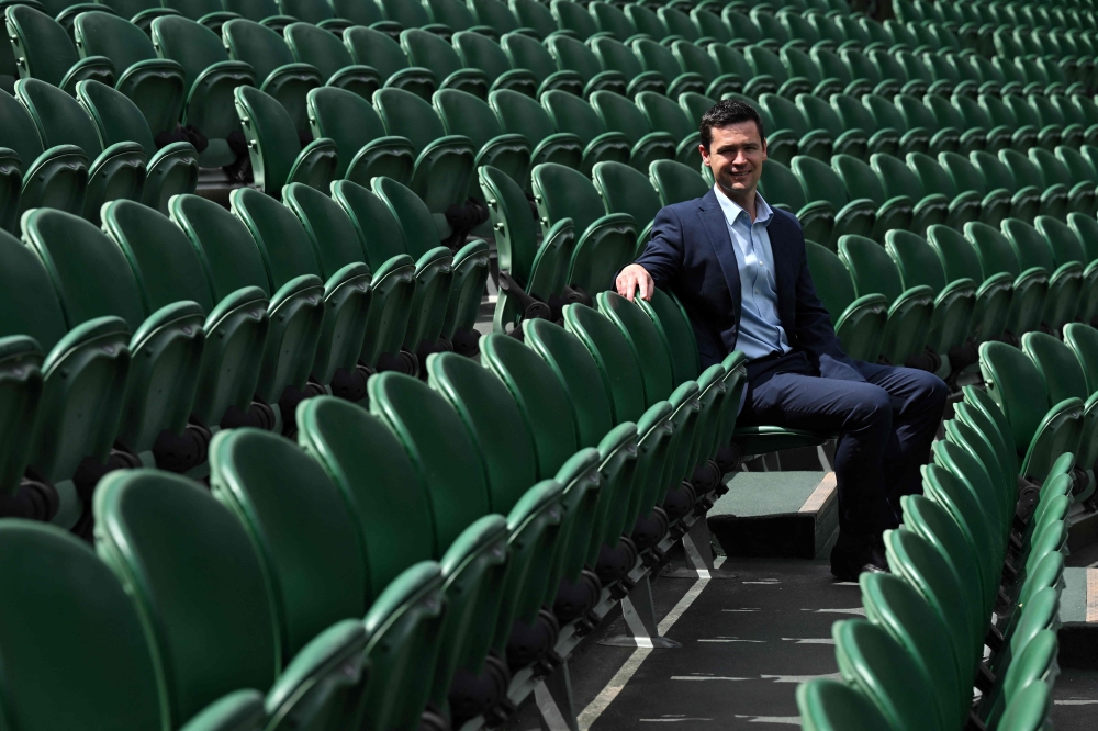Wimbledon Tournament Director Jamie Baker pictured sitting in centre court at the All England Lawn Tennis & Croquet Club in Wimbledon June 24, 2025. — AFP pic