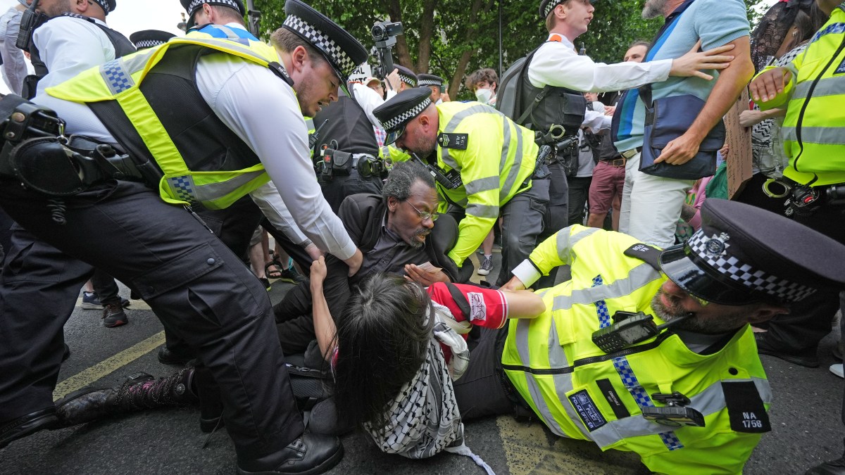 police clash with protesters in London — follow live