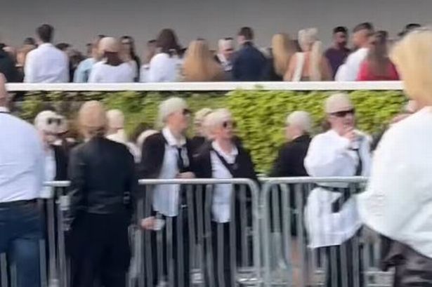 Fans dressed up with bald caps as Pitbull ahead of his huge show in Manchester