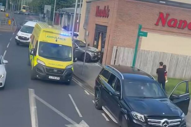 One of the cars narrowly missed a lamppost before hitting the restaurant
