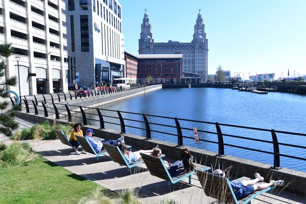 People relaxing in the sunshine at Princes Dock. (Pic Andrew Teebay).