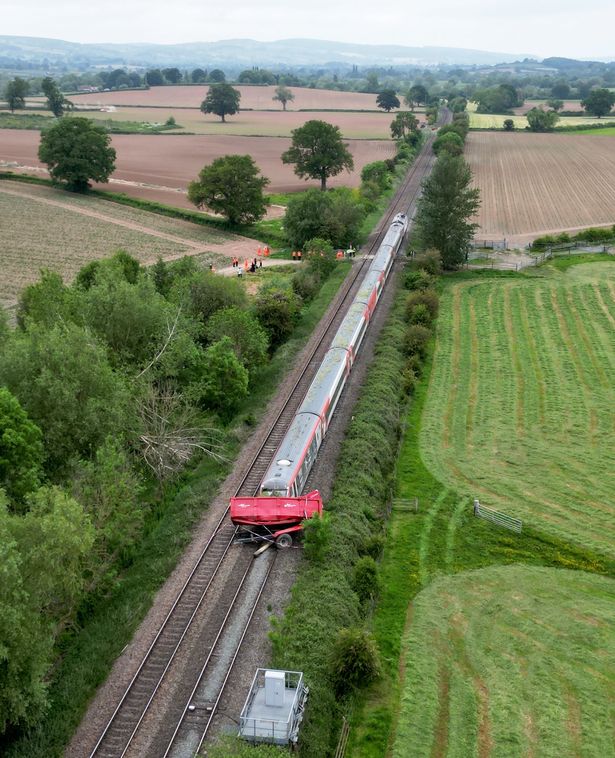 Dramatic aerial pictures capture the scene of the collision where a passenger train crashed into a tractor and trailer near to Nordan Farm, in Leominster, Herefordshire