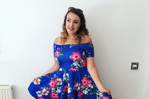 A young lady in a blue dress