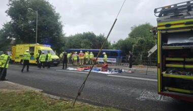 Dozen injured as bus carrying students crashes into river in southern England
