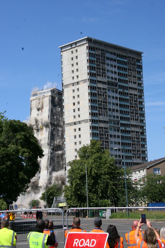 Controlled demolition of two tower blocks in Glasgow.