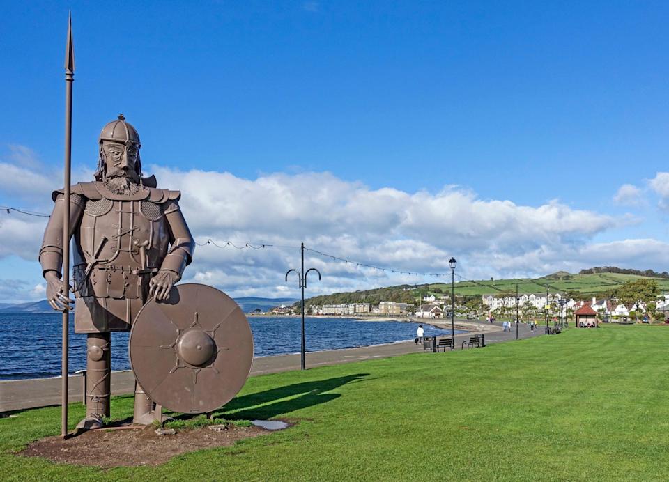Statue of Magnus the Viking standing at the seafront