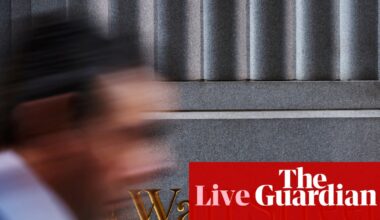 Wall Street hits record high on trade deal hopes; UK car exports to US halve due to tariffs – as it happened | Business