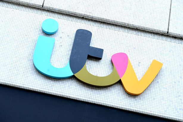 The logo for ITV on a building.