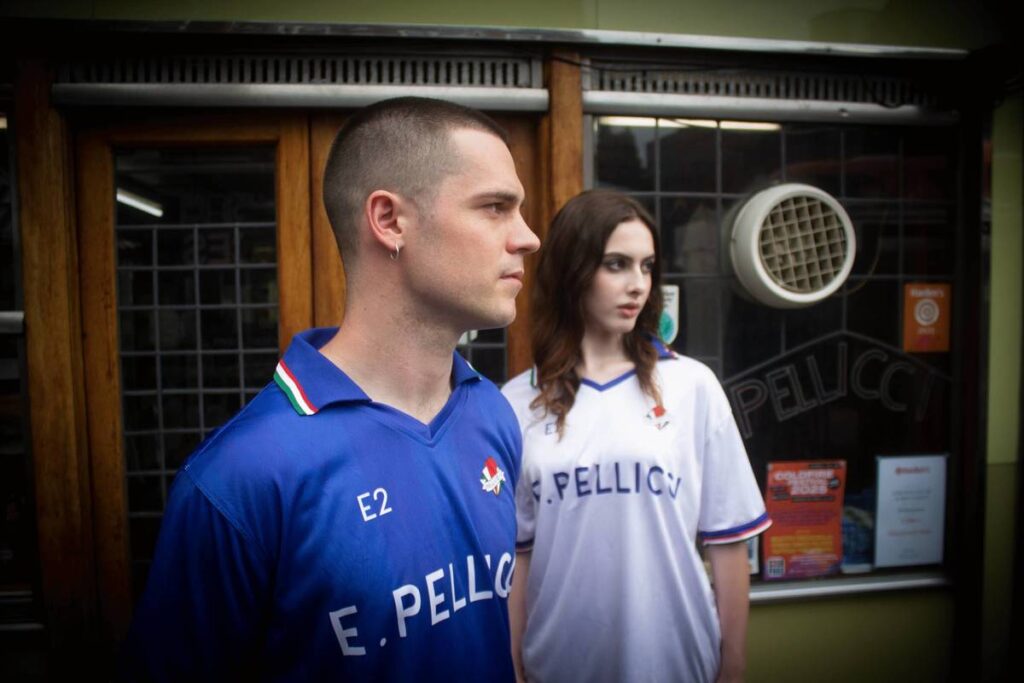 Two models donning the E. Pellici football jersey