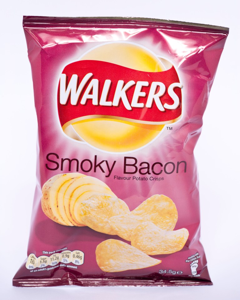 Bag of Walkers Smoky Bacon potato crisps.