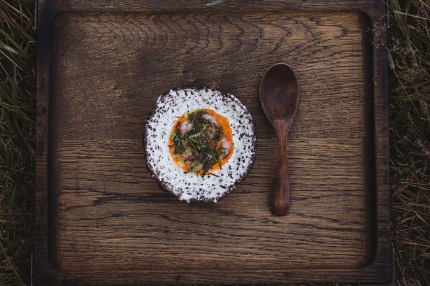 A plate of Raw Lobester Tail Nahm Jim