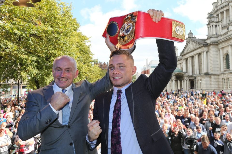 Carl Frampton and Barry McGuigan at a reception outside Belfast City Hall after Frampton became IBF super-bantamweight world champion in 2014   (Pacemaker)